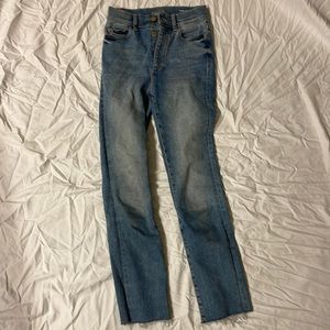 Button fly, raw hem DL1961 jeans